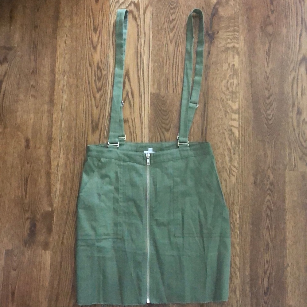 Green overall mini skirt